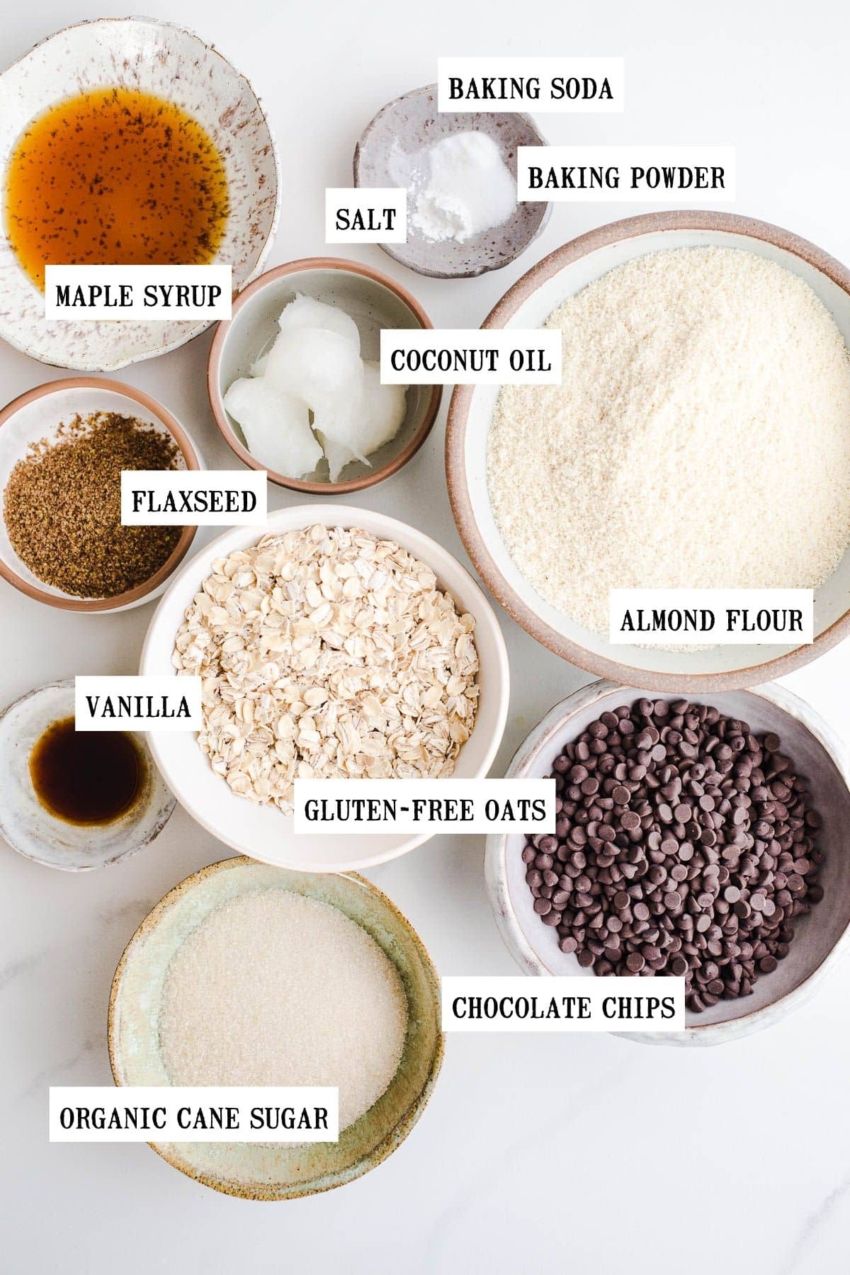 Ingredients to make gluten-free cookies in small bowls.