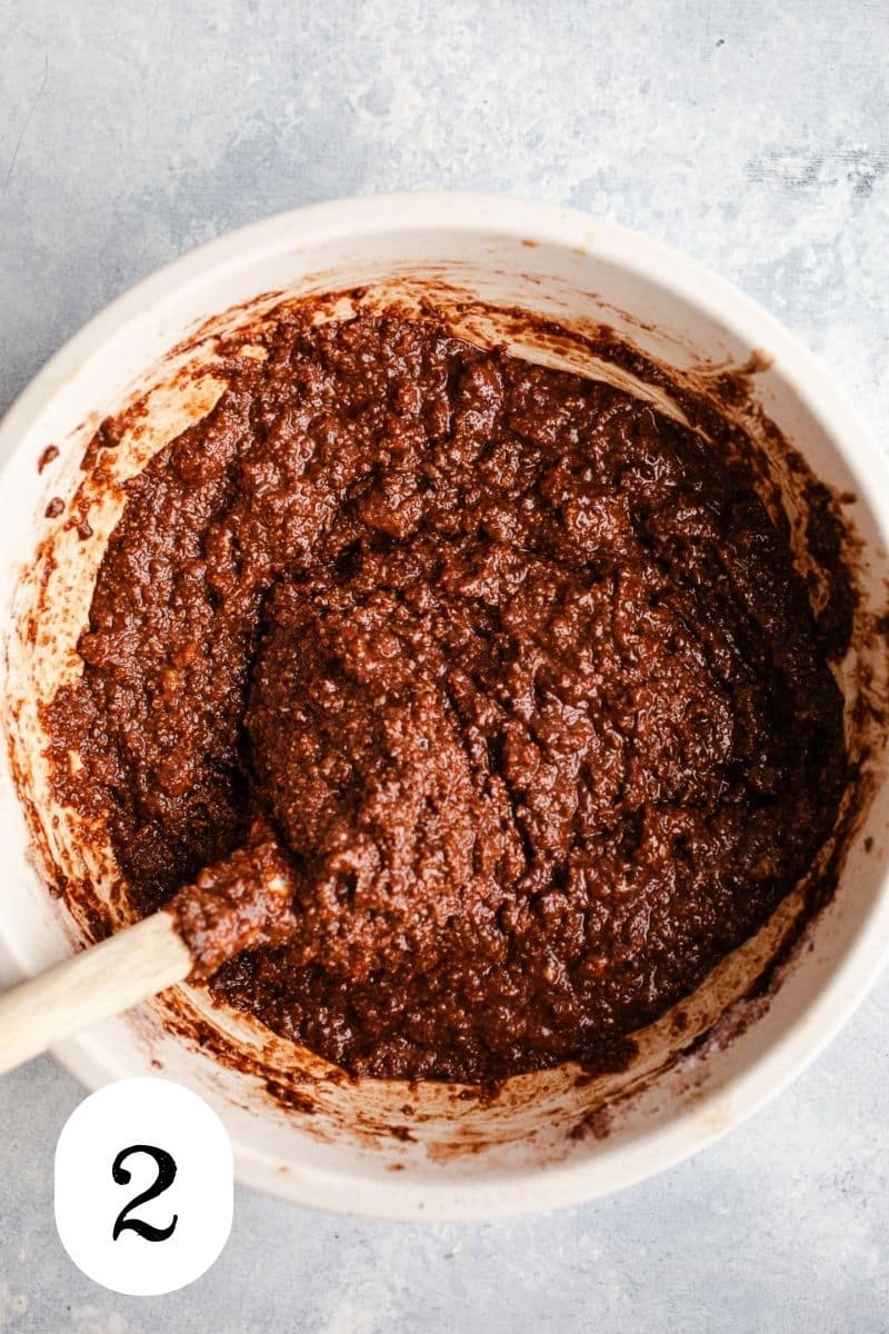 Chocolate muffin batter in a mixing bowl. 