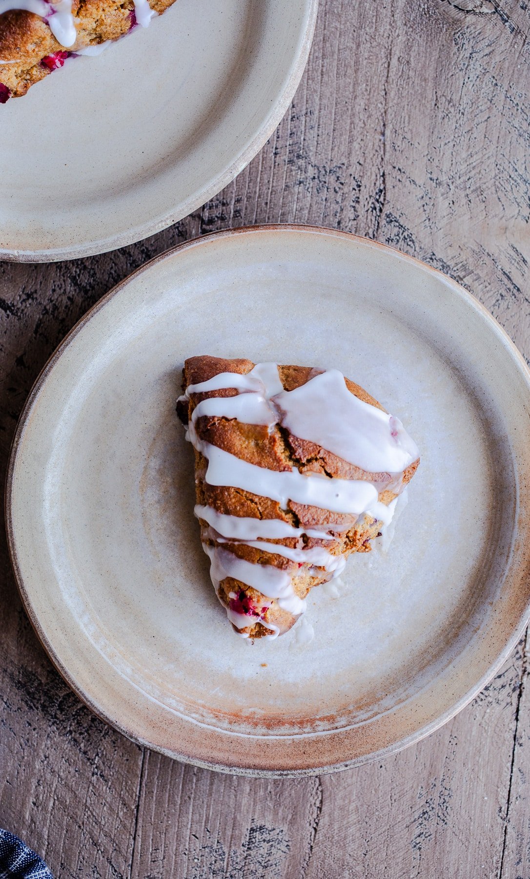 A scone on a plate. 