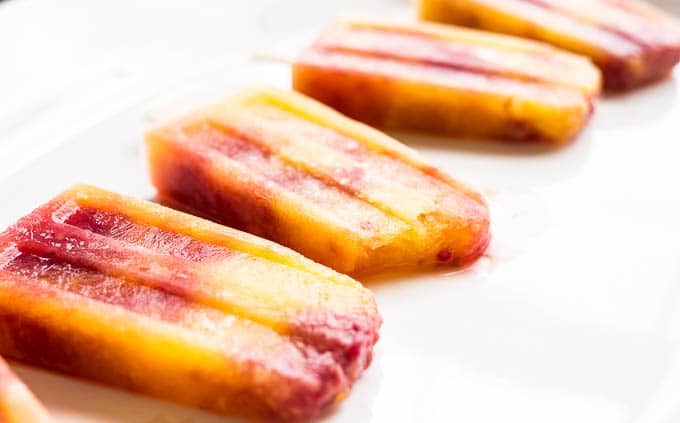 Mango Raspberry Bellini Popsicles | saltedplains.com