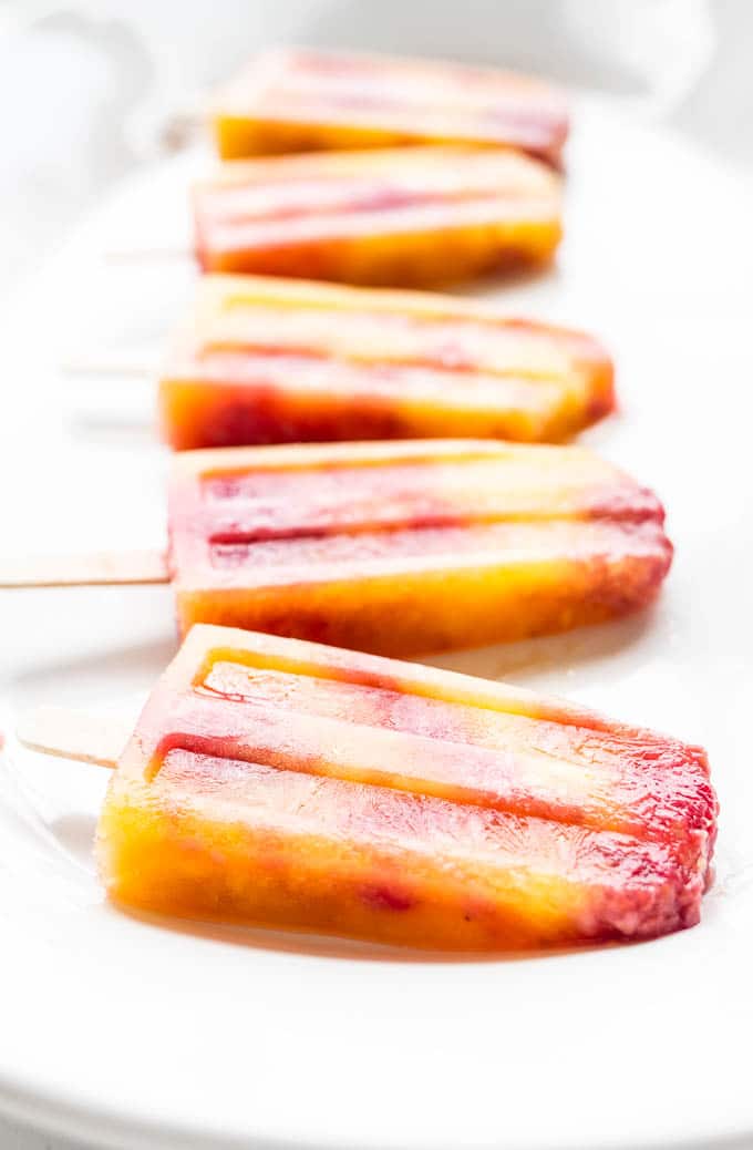 Mango Raspberry Bellini Popsicles | saltedplains.com