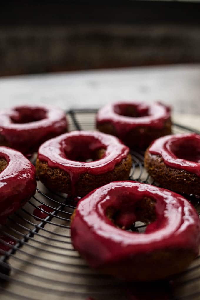 Gingerbread Cake Donuts with Cranberry Glaze (gluten-free, vegan) | saltedplains.com