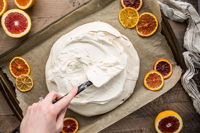 Pavlova with Mascarpone Coconut Cream and Candied Citrus (gluten-free) | saltedplains.com