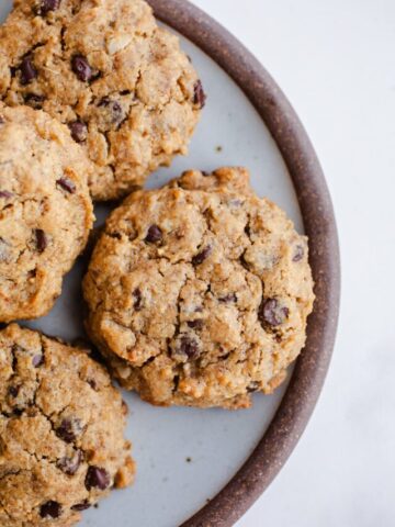 Oatmeal chocolate chip cookies on a plate.