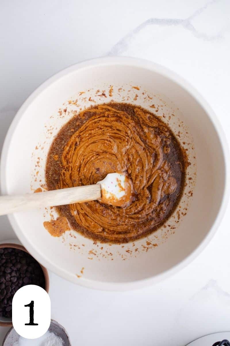 Flaxseed and peanut butter in a mixing bowl. 