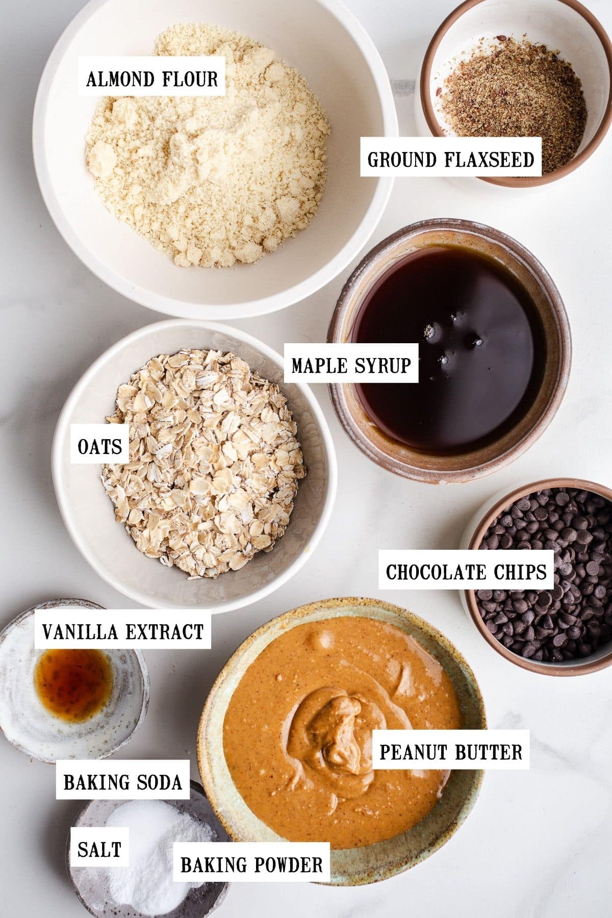 Ingredients to make cookies in small bowls. 