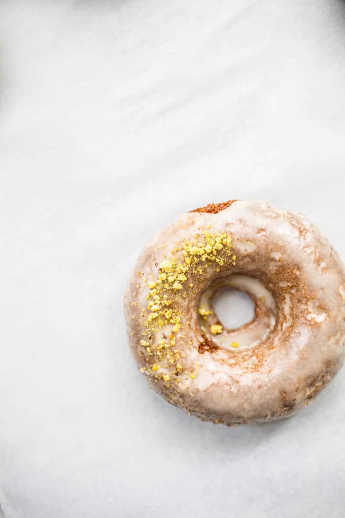 Irish Coffee Cake Donuts with glaze and pistachios.