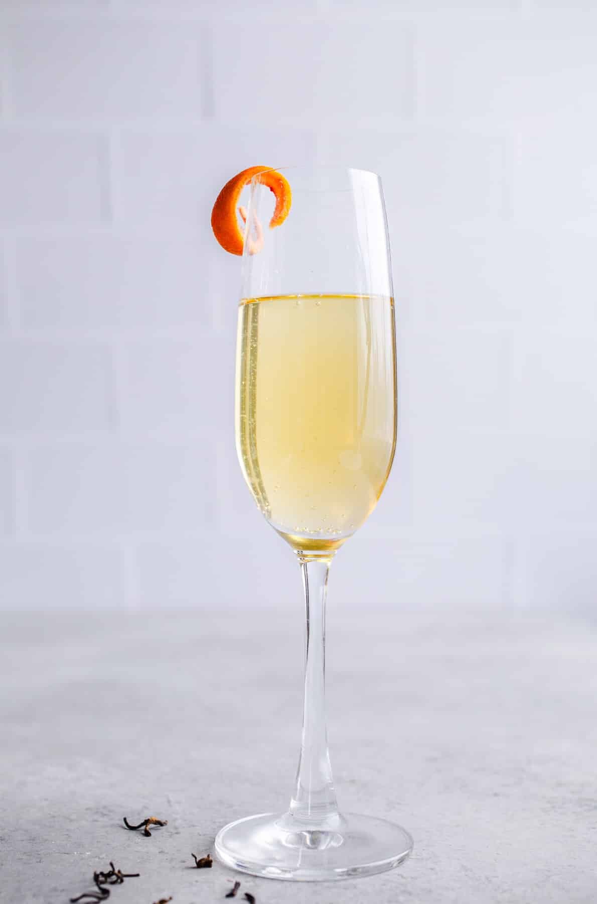 A cocktail in a champagne flute. 
