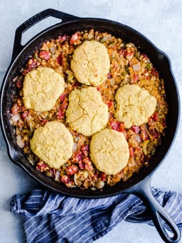 Lentils and cornbread in a skillet.