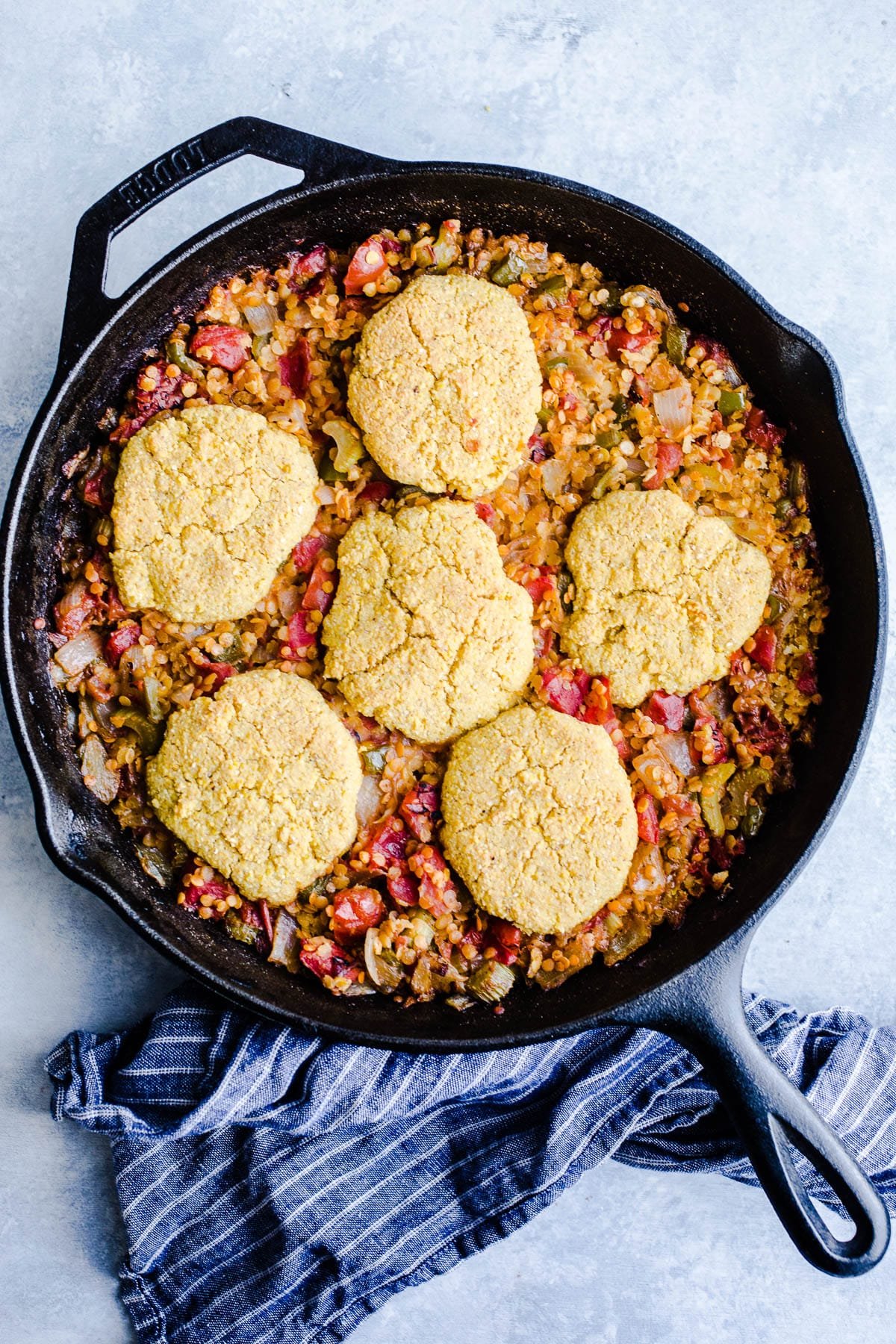 Lentils and cornbread in a skillet. 