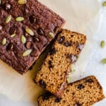 Pumpkin bread slices on parchment.