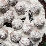 Snowball cookies on a plate.
