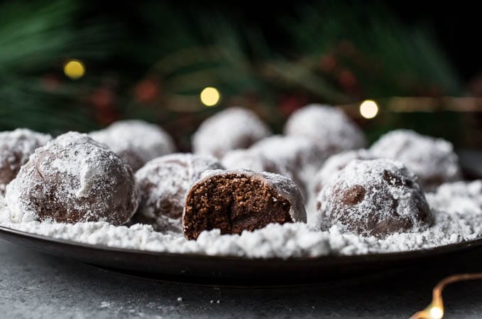 chocolate cookie balls with powdered sugar