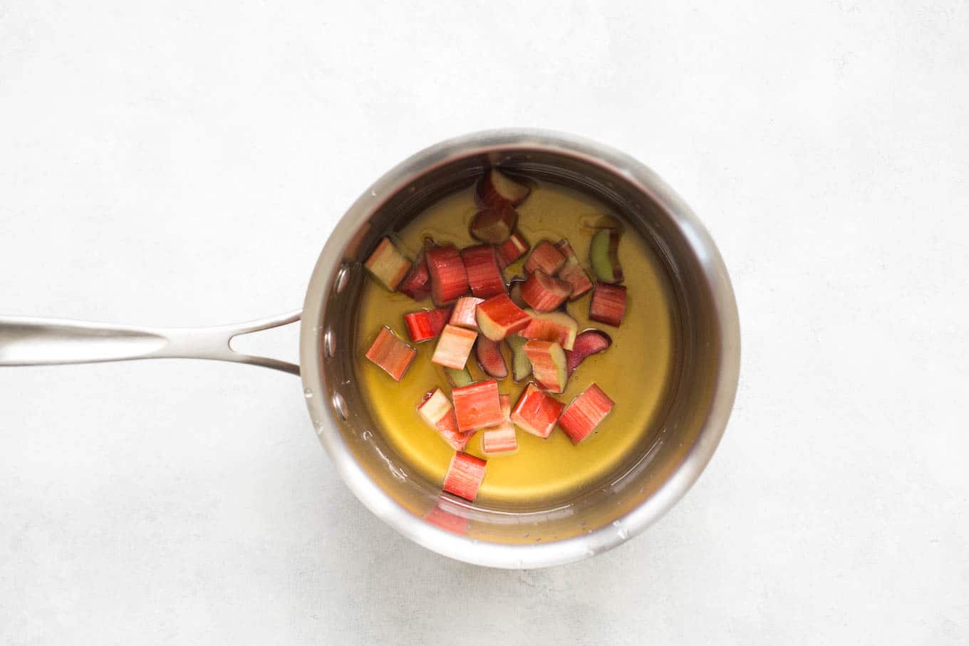 rhubarb and honey in pan