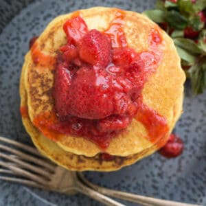 Corn pancakes topped with strawberry compote.