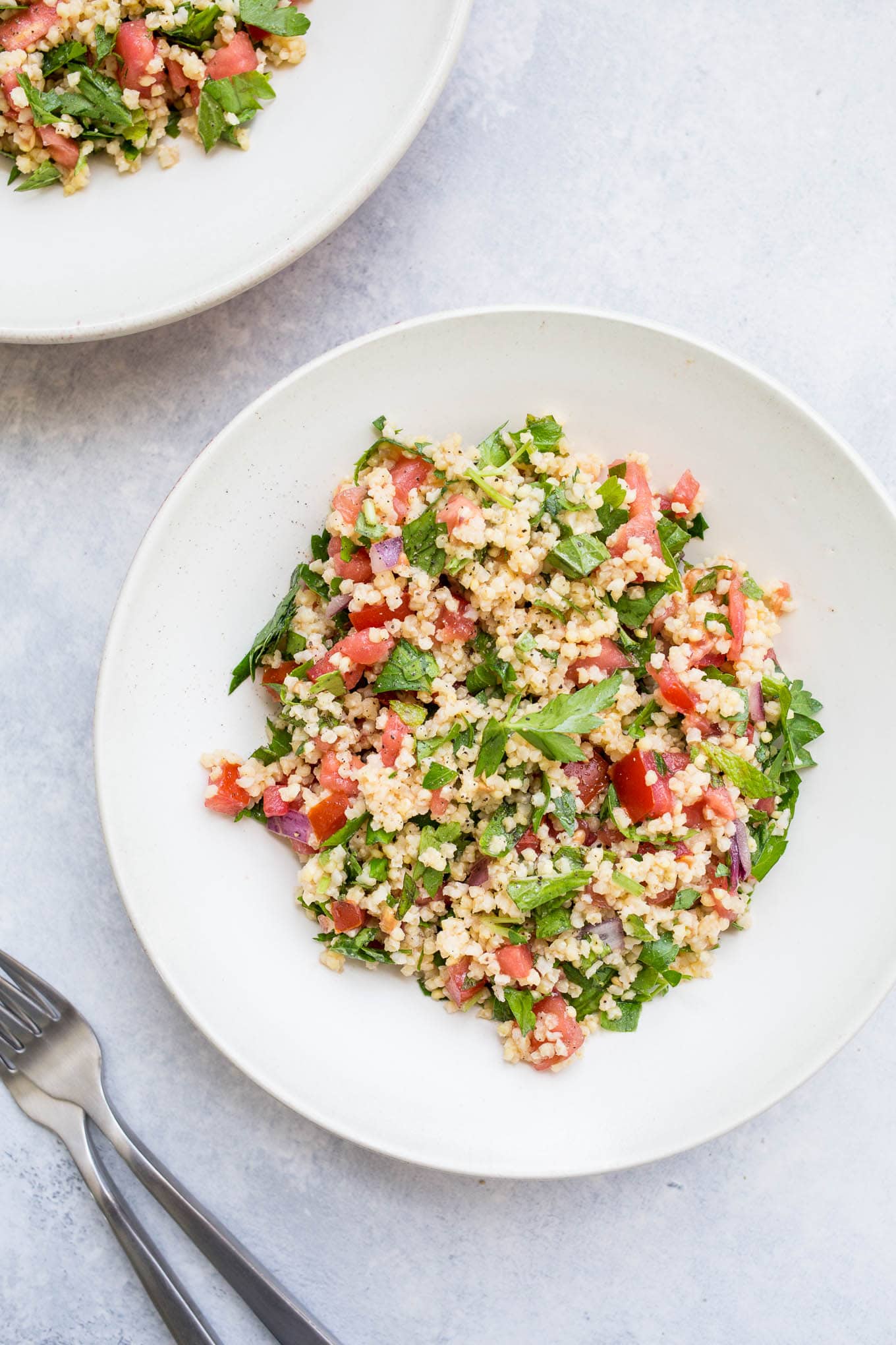 A serving of tabbouleh in a large bowl. 