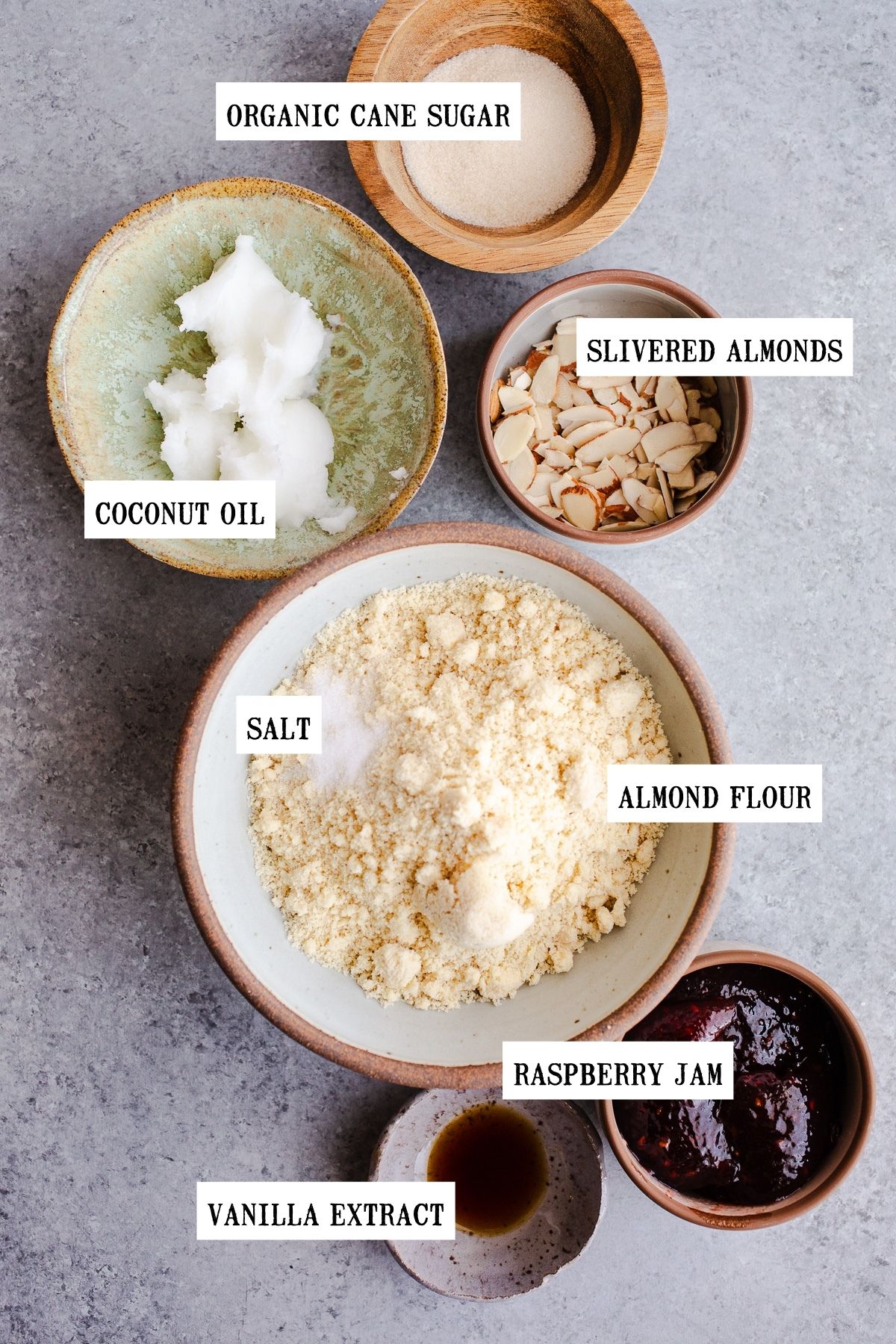 Ingredients for a tart in small bowls. 
