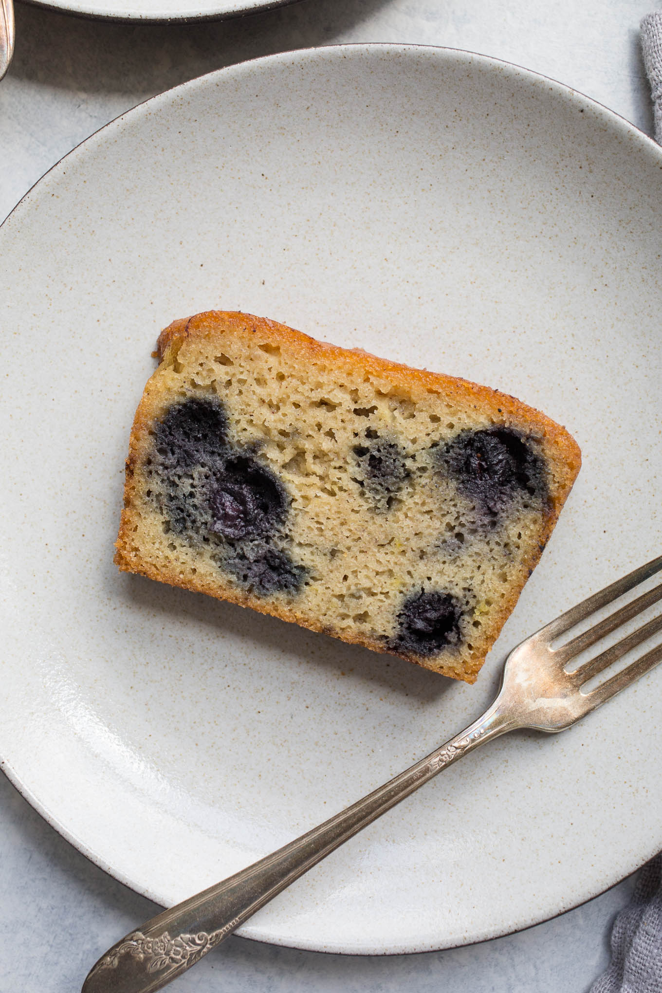 Lemony Almond-Blueberry Cake on plate