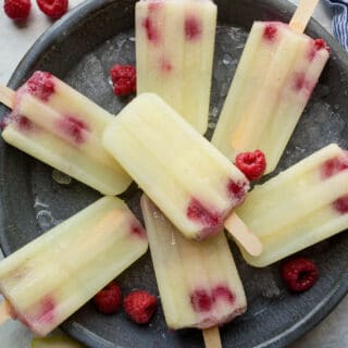 Popsicles on a blue tray.