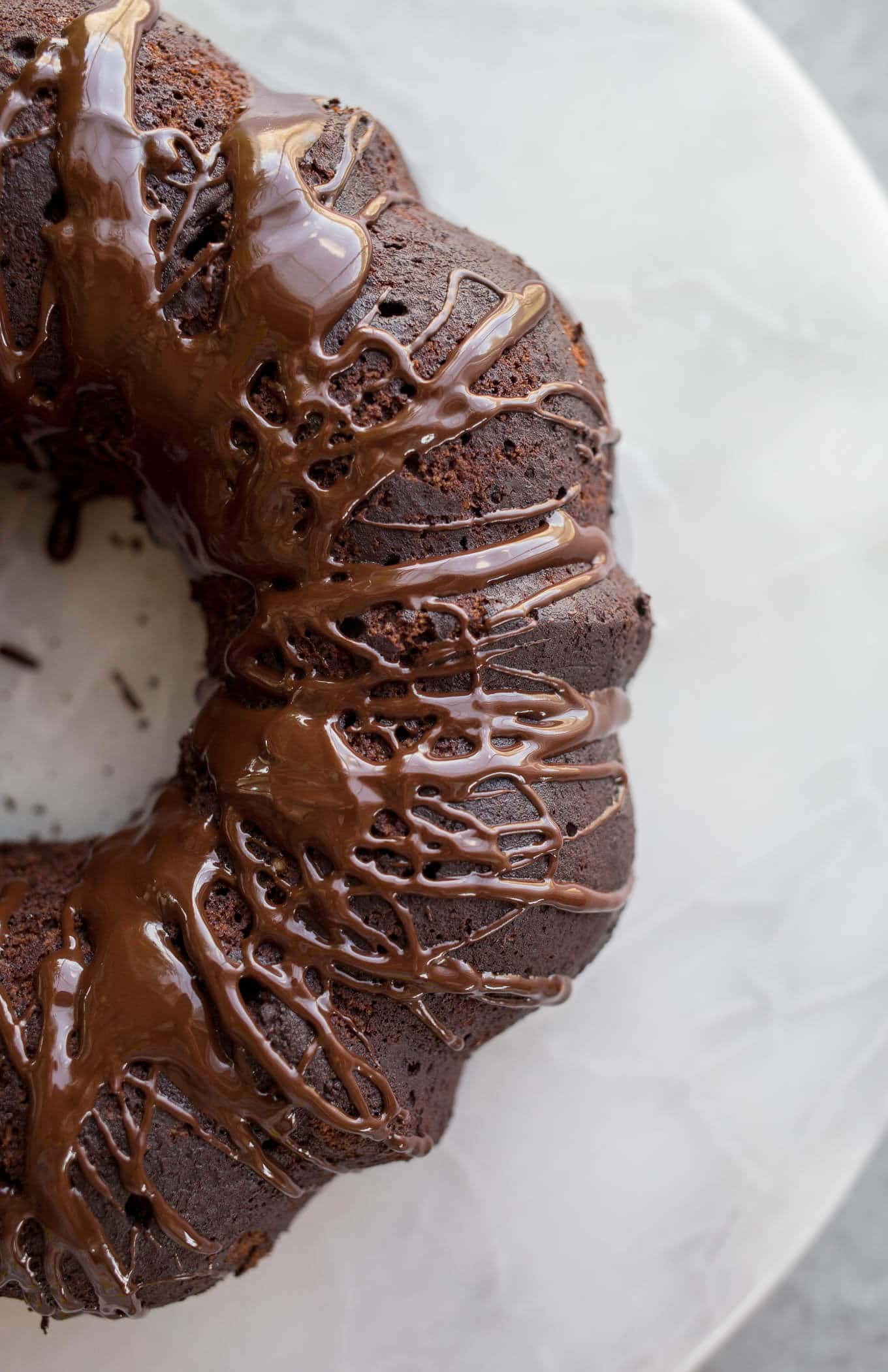 Chocolate drizzle on top of a bundt cake. 