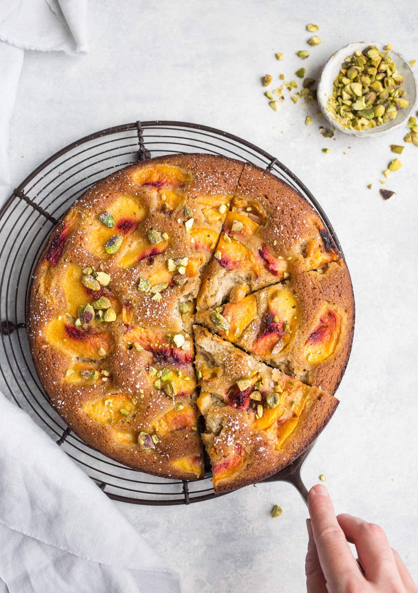 This deliciously moist Olive Oil Cake with Peaches made with almond flour and corn flour is a wholesome treat. Gluten-free, dairy-free, refined sugar-free.