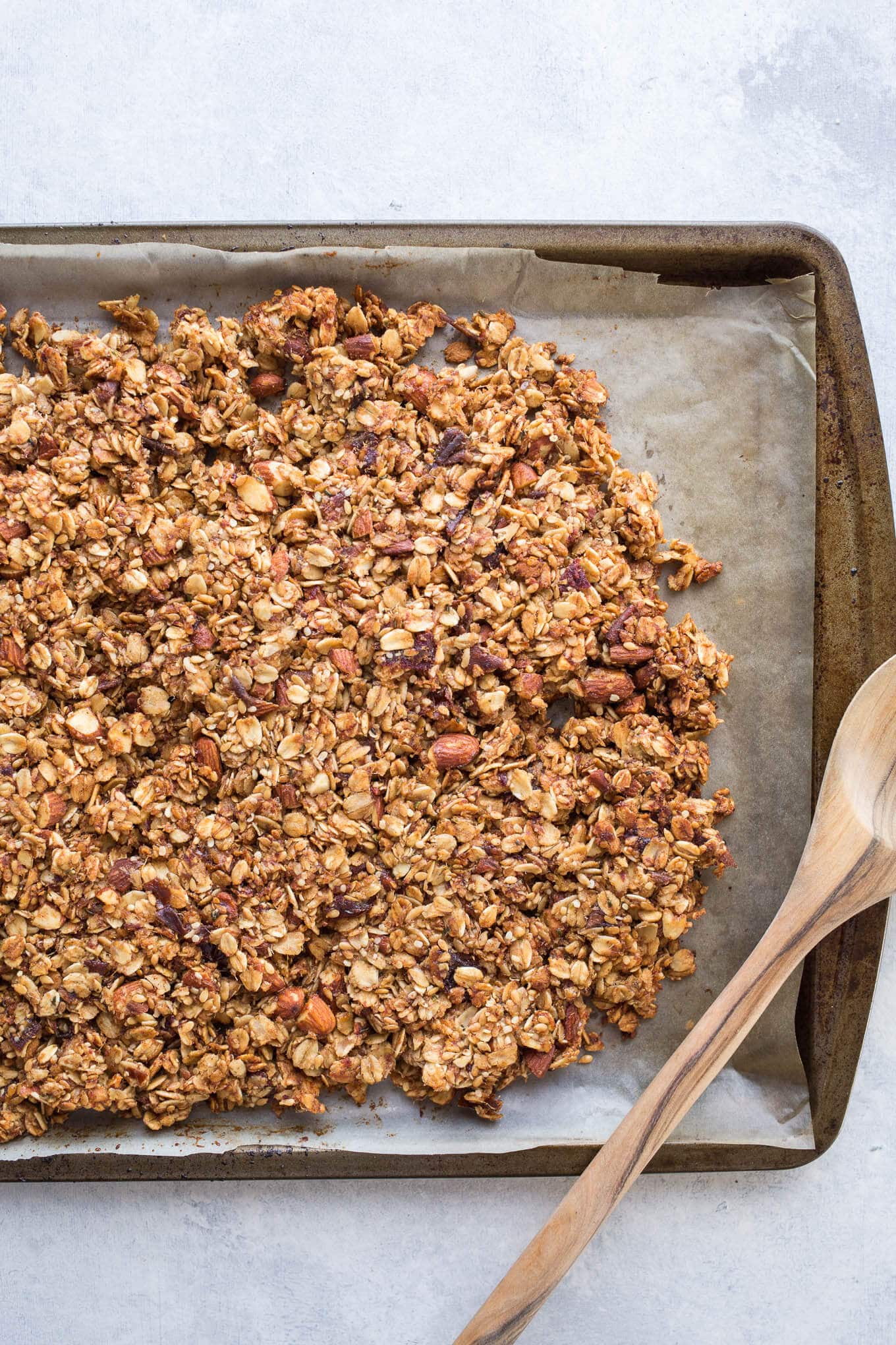 An easy Maple Date Granola recipe that will have you coming back for more. Naturally sweetened with maple syrup and Medjool dates and loaded with gluten-free oats, almonds, hemp seeds, and flaxseeds. Gluten-free and vegan.