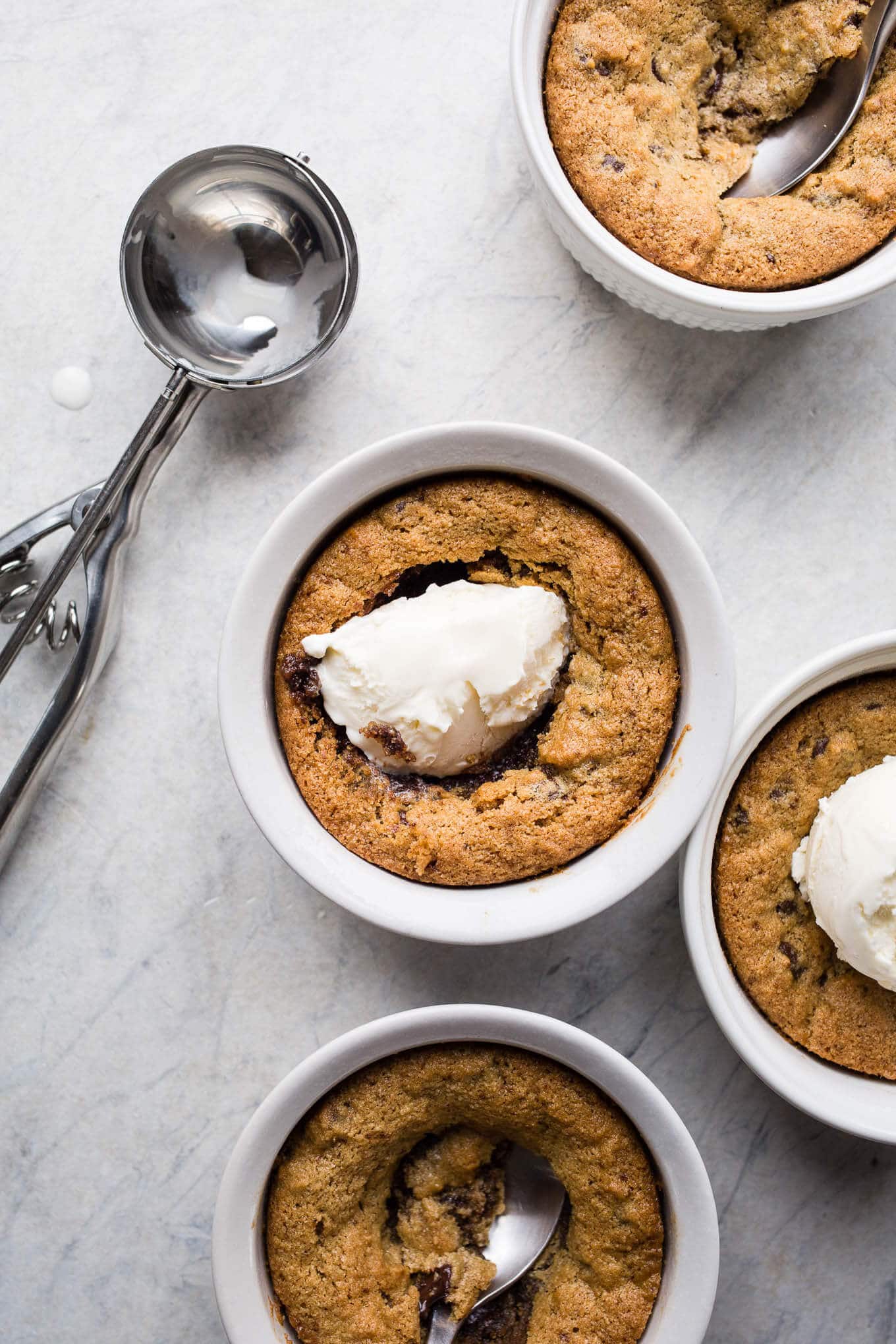 Cookie pots in white ramekins.