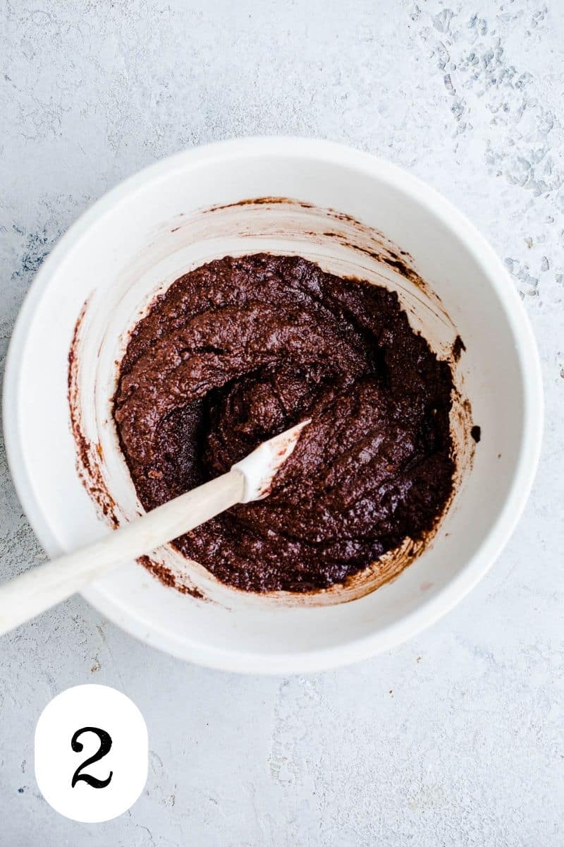 Chocolate cookie dough batter in a mixing bowl. 