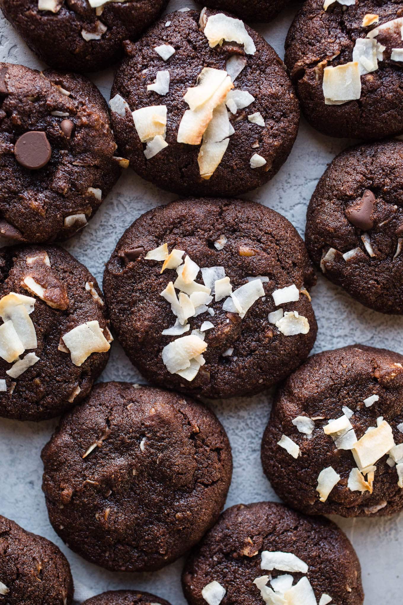 Double Chocolate Coconut Pecan Cookies are rich, chocolatey, and loaded with flaked coconut, pecans, and chocolate chips. Gluten-free, paleo, dairy-free.