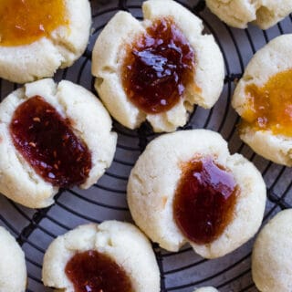 Almond Jam Thumbprints are an easy cookie filled with your favorite jam! Gluten-free.