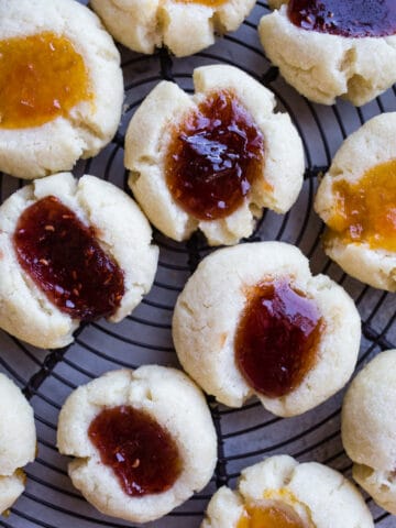 Almond Jam Thumbprints are an easy cookie filled with your favorite jam! Gluten-free.