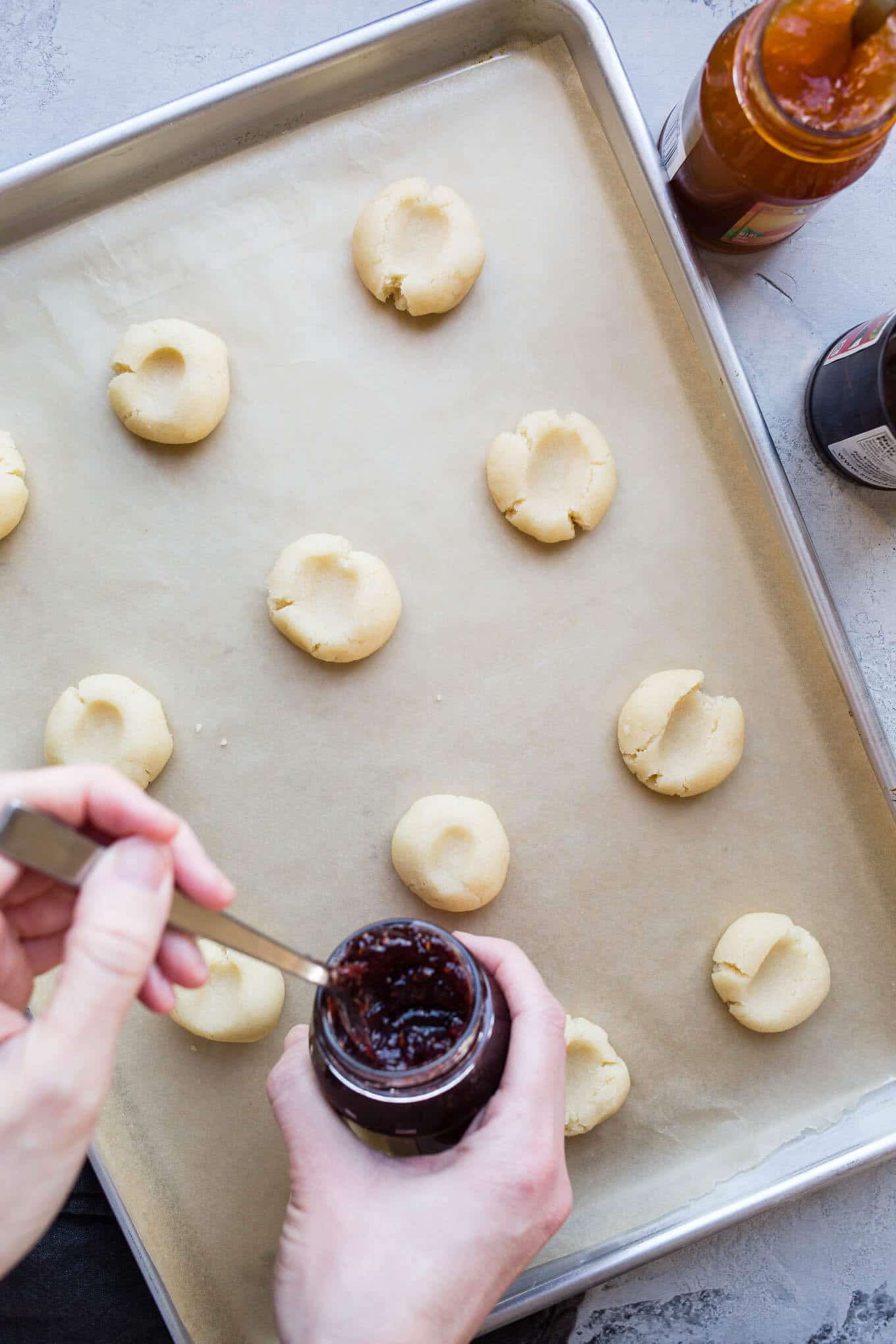 Almond Jam Thumbprints are an easy cookie filled with your favorite jam! Gluten-free. 