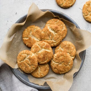 Snickerdoodle cookies on a blue platter.