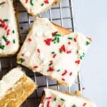 Sugar cookie bars on a wire rack.