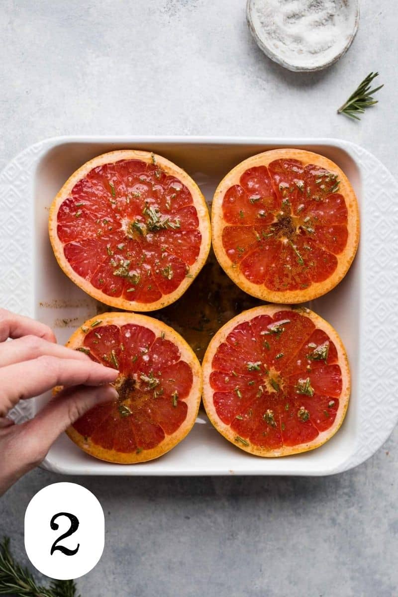 Grapefruit halves in a baking dish. 