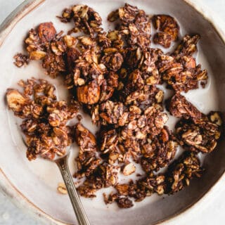 Homemade Almond Joy Granola made with gluten-free oats, unsweetened shredded coconut, raw almonds, and chocolate. A gluten-free, vegan, and refined sugar-free recipe!