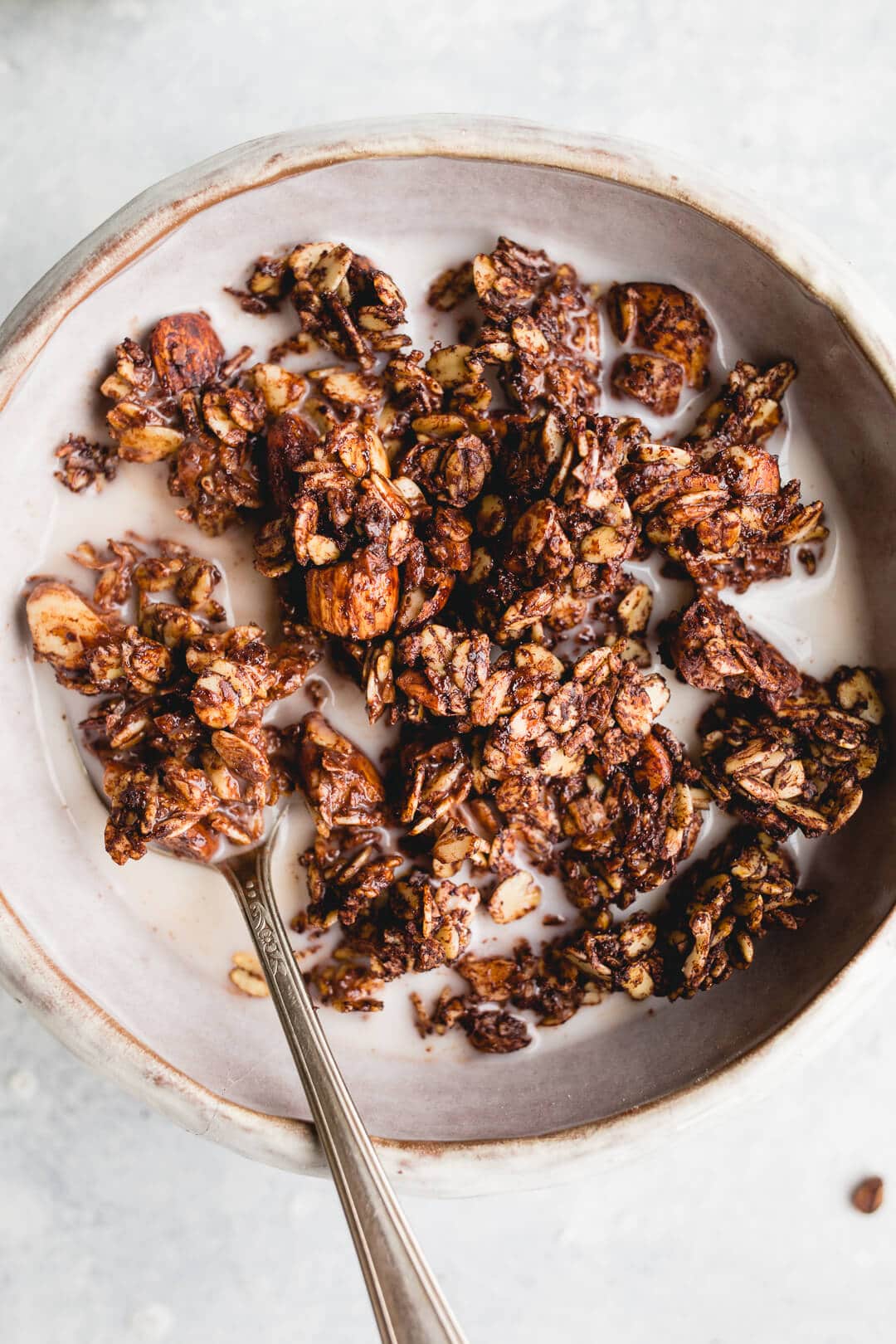 Homemade Almond Joy Granola made with gluten-free oats, unsweetened shredded coconut, raw almonds, and chocolate. A gluten-free, vegan, and refined sugar-free recipe!