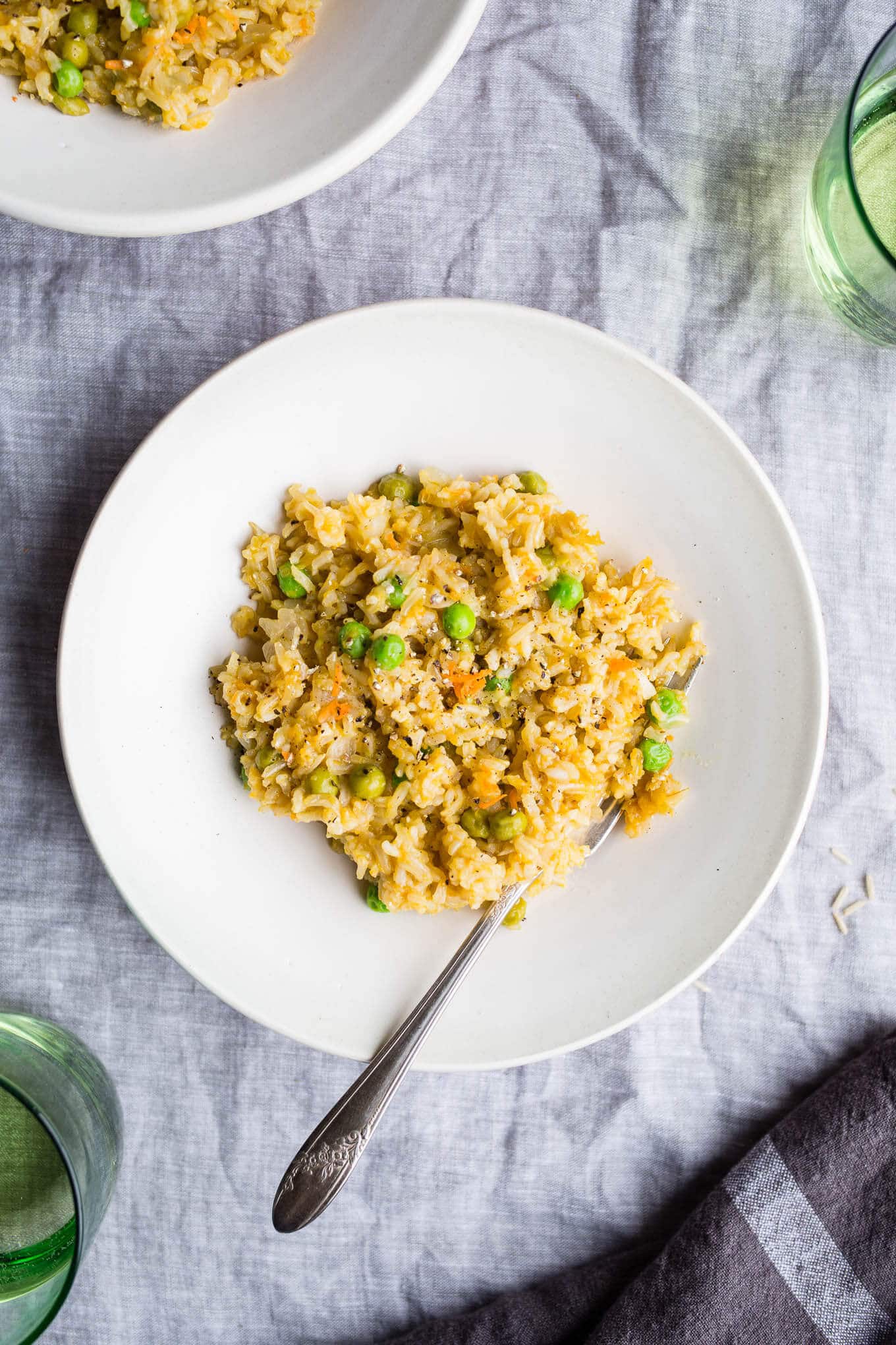 Brown Rice Risotto with Peas and Carrots is a gluten-free and vegan one-pot meal made with simple ingredients. 