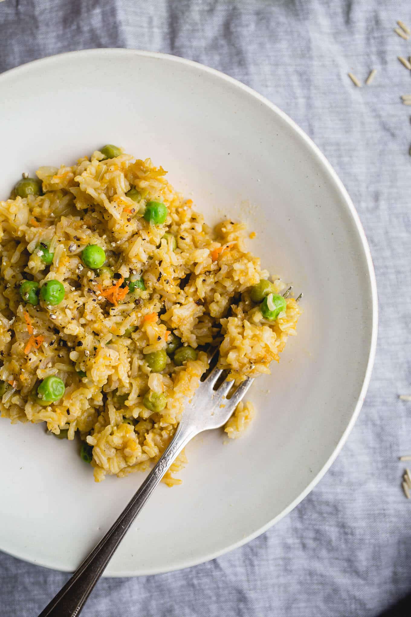 Brown Rice Risotto with Peas and Carrots is a gluten-free and vegan one-pot meal made with simple ingredients. 