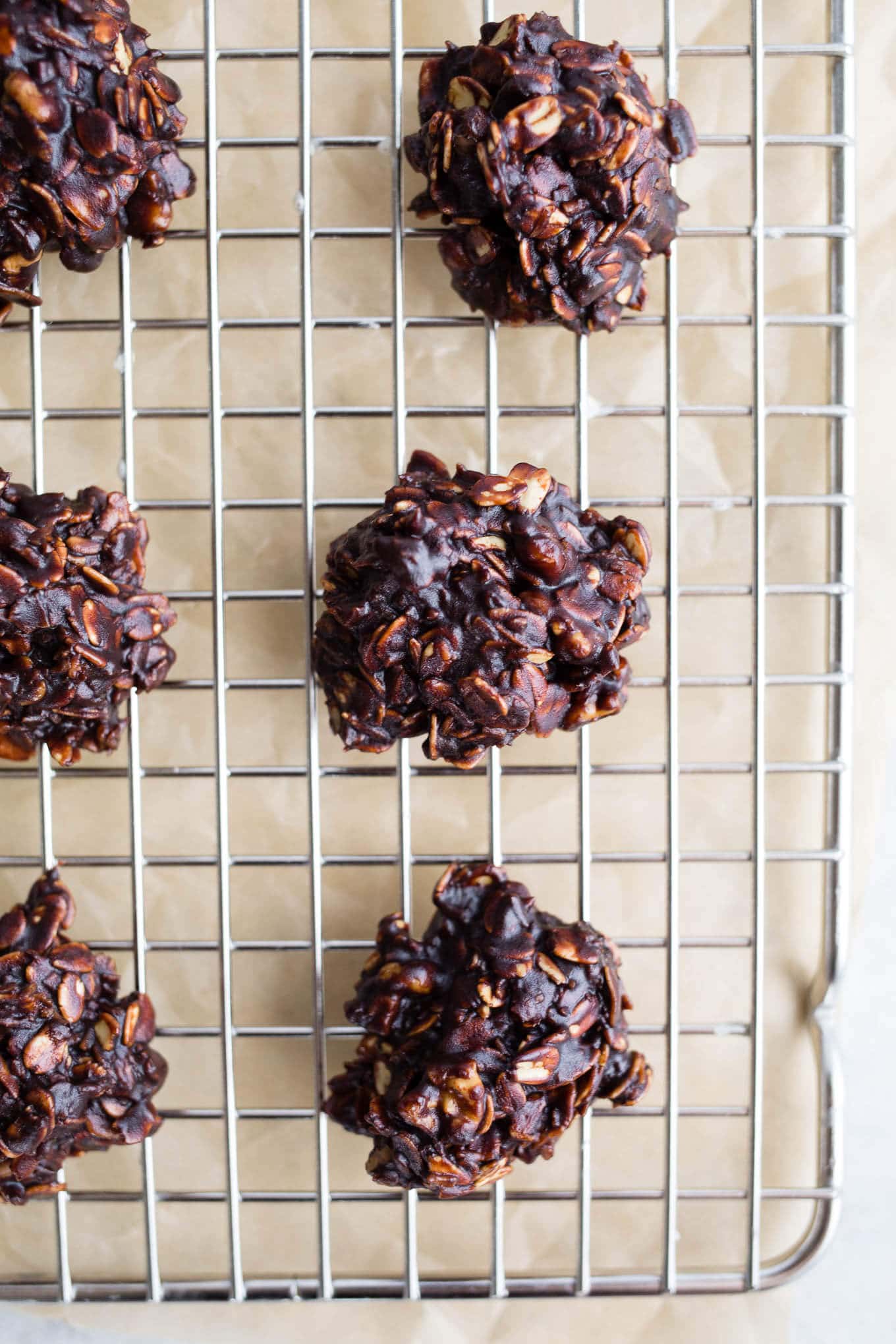 Chocolate Oatmeal No Bake Cookies are made with coconut, gluten-free oats, cocoa powder, walnuts, and sweetened with coconut sugar. A healthy no bake cookie recipe that is gluten-free and vegan. #glutenfree