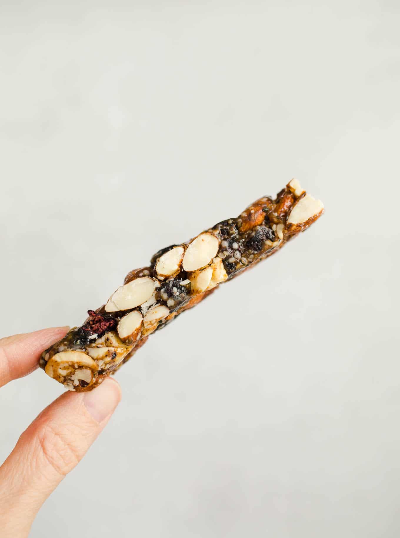 Blueberry Almond Granola Bars made with raw almonds, cashews, and hemp seeds, and bursting with dried blueberries. A healthy granola bars recipe made without refined sugar. Gluten-free, vegan. 