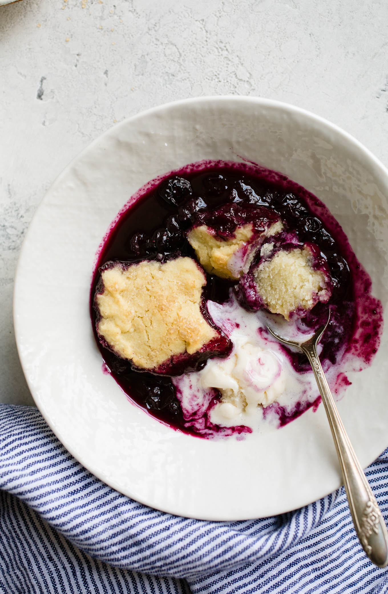 Gluten-Free Blueberry Cobbler with Almond Flour Biscuits is loaded with fresh blueberries, a hint of lemon, and topped with soft, lightly sweetened biscuits. A dairy-free and vegan cobbler recipe.