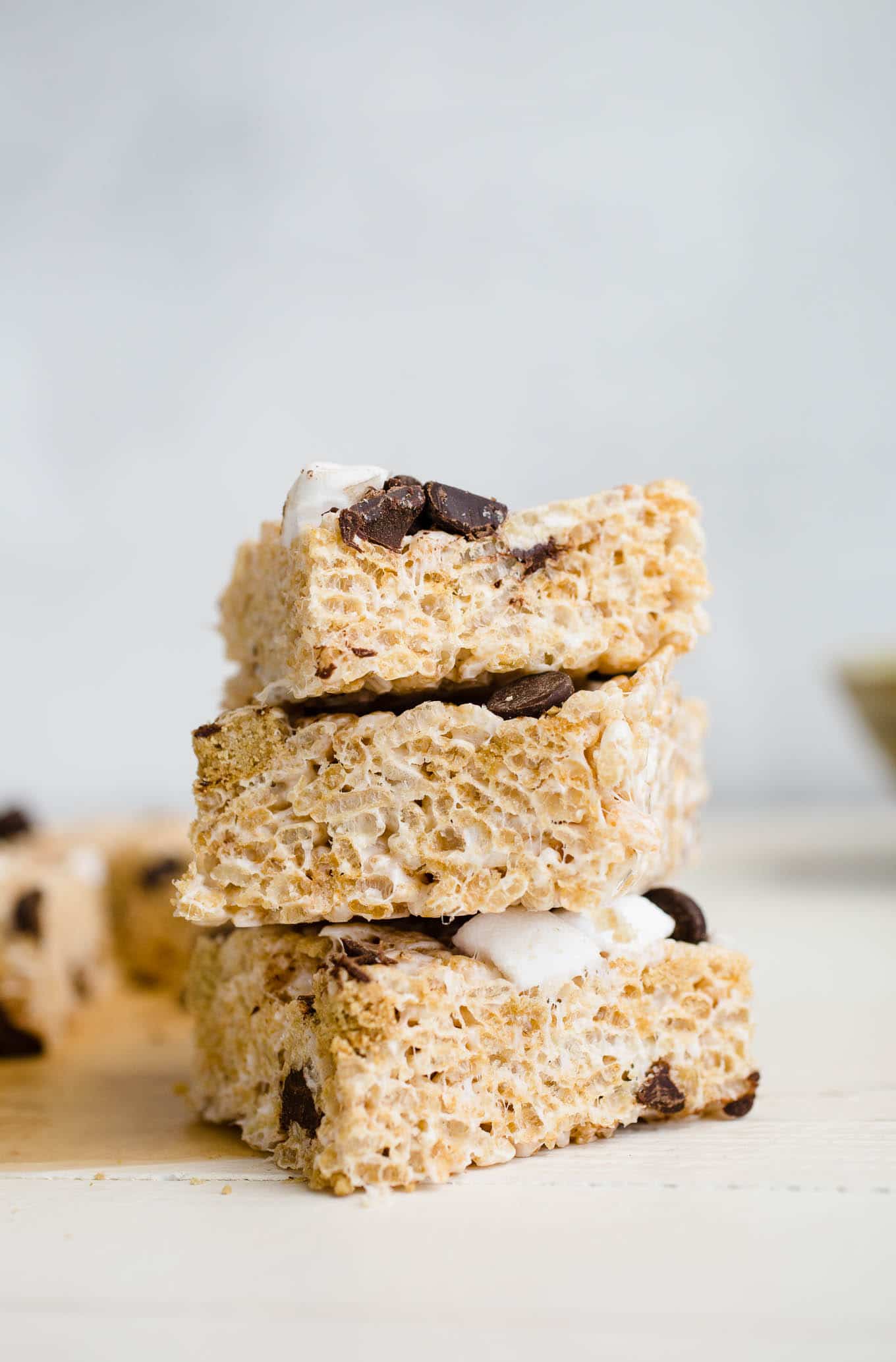 rice cereals treats stacked on parchment paper