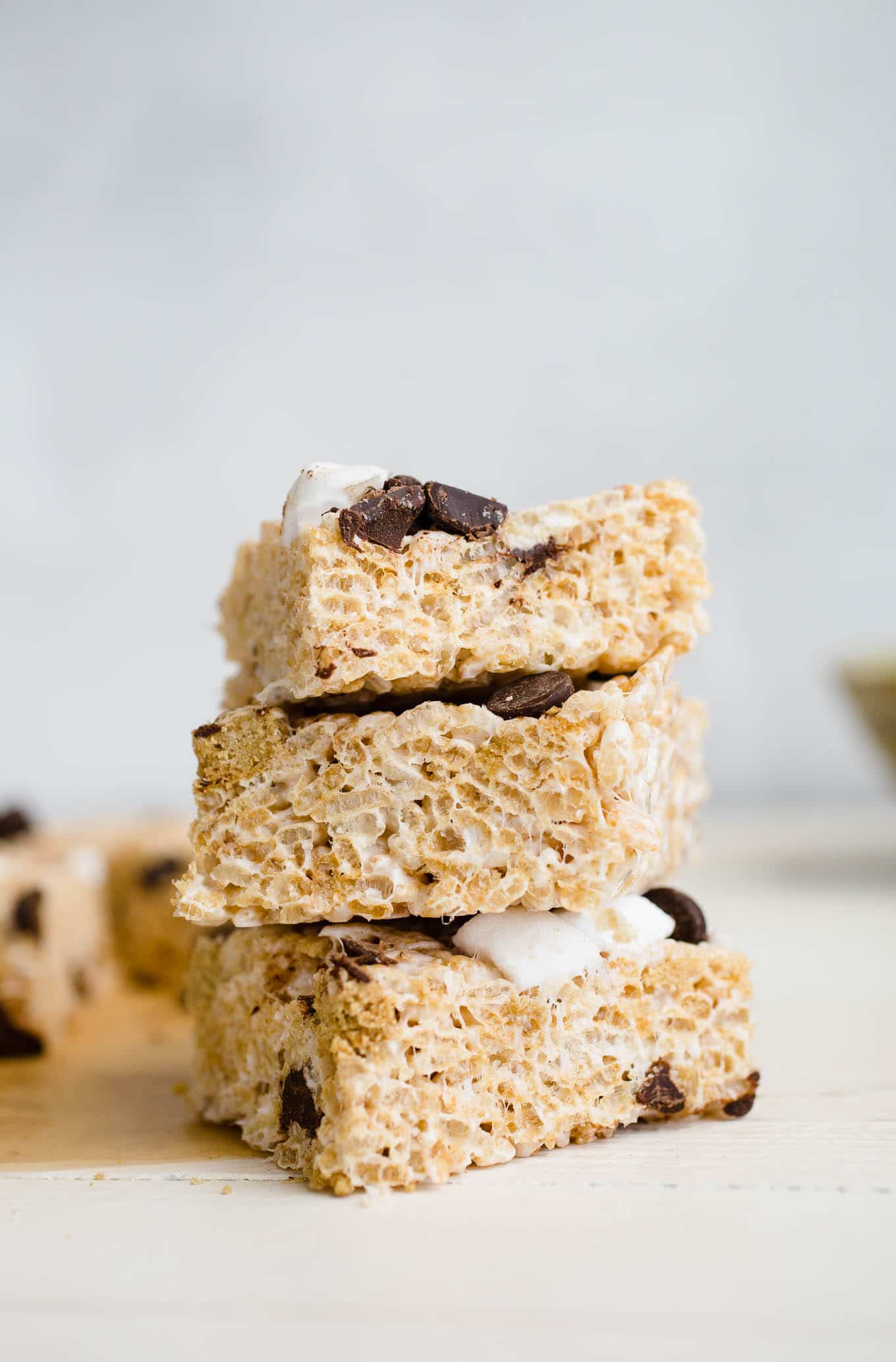 Marshmallow squares stacked on a surface.