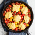 Gluten-Free Tomato Cobbler with Corn Flour Biscuits makes for savory side dish or a vegetarian main course. An easy tomato cobbler recipe that is vegan too!