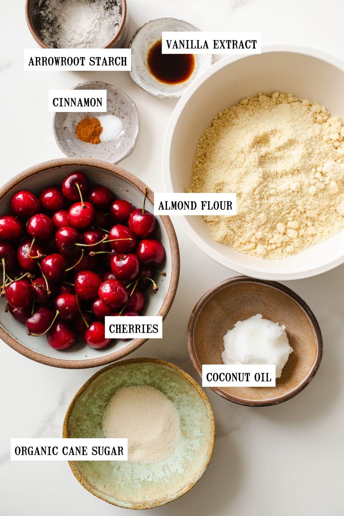 Ingredients to make pie bars in small bowls.