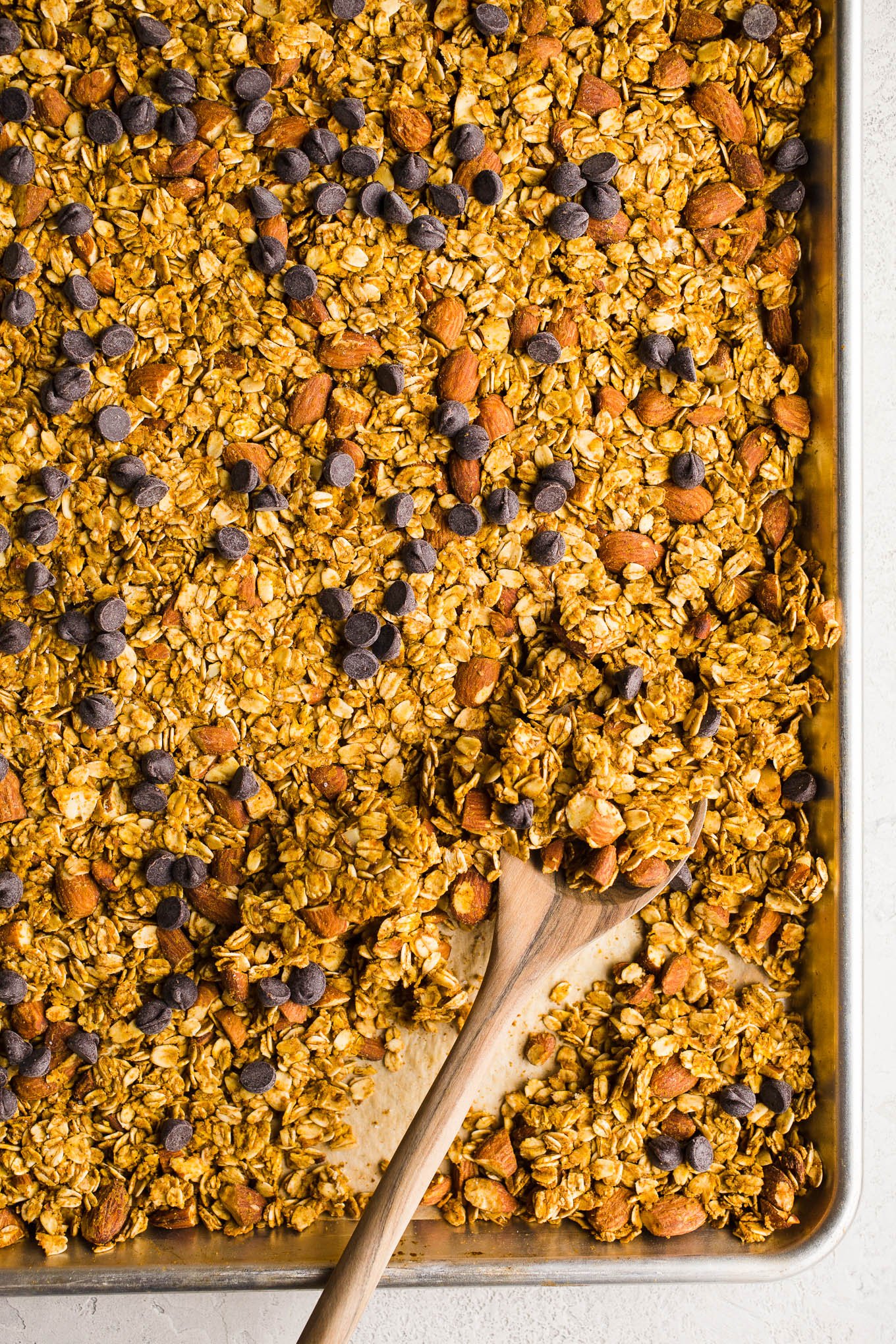 Baked granola on a baking sheet.