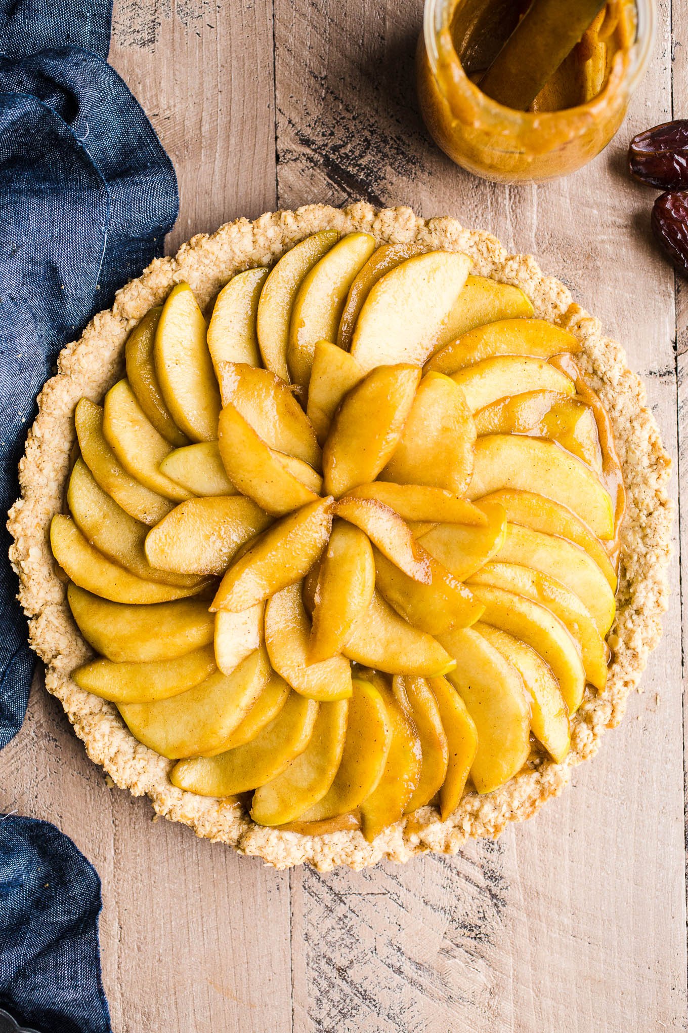 tart with sliced apples and caramel