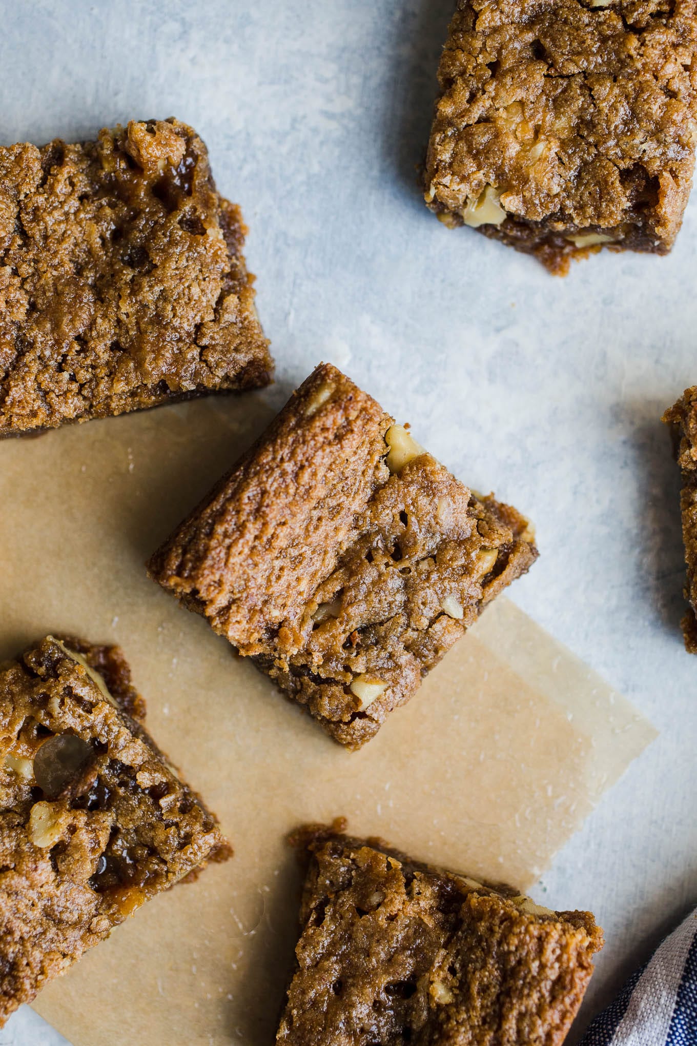 Gluten-Free Maple Walnut Blondies made with almond flour, sweet rice flour, almond butter, walnuts, and infused with maple syrup. A delicious flavor combination that makes for a chewy vegan blondie recipe.