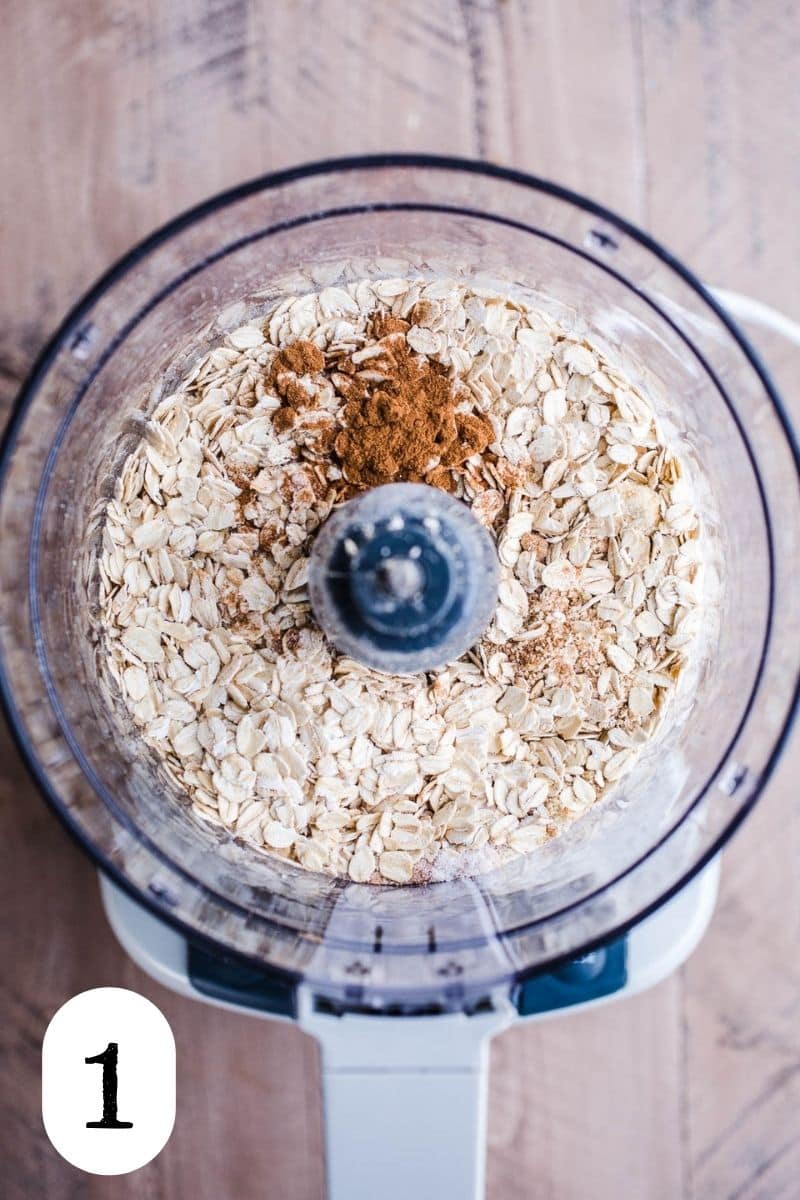 Oats and cinnamon in a food processor.